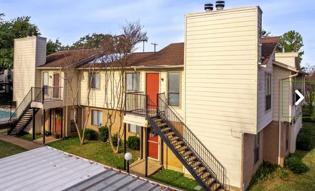 a view of a house with many windows