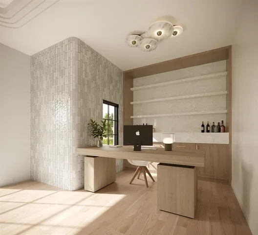 a workspace with furniture and window