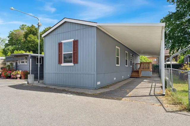 a front view of a house with a garage