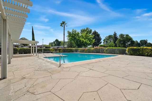 a view of a house with swimming pool