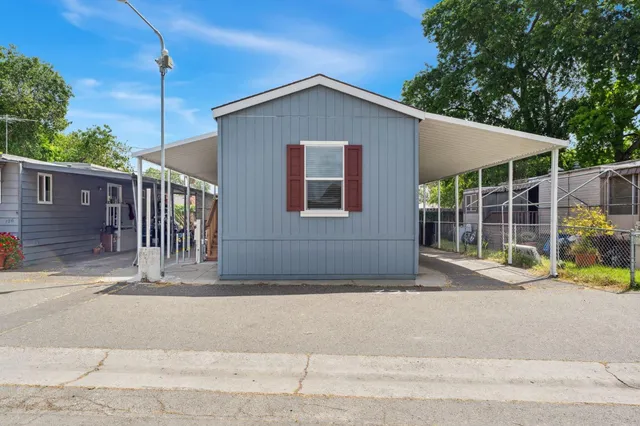 a front view of a house with a garage
