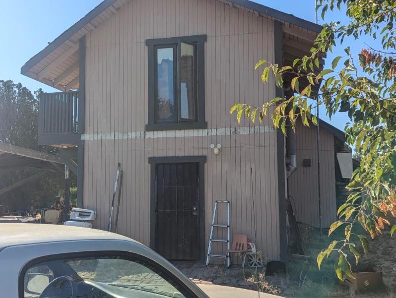 4660 East Morse Road Lodi, CA 95240 - Photo 2 of 8 a front view of a house
