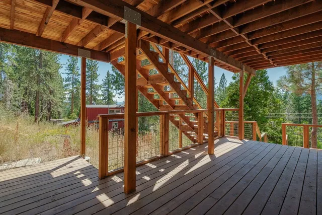 a view of balcony with wooden floor