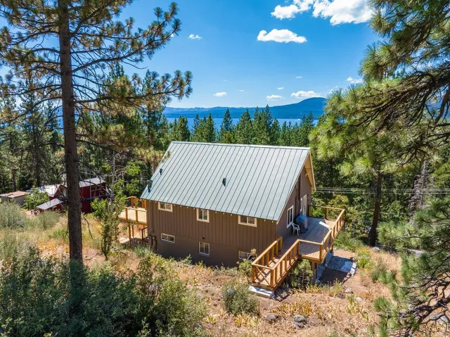 an outdoor sitting area with golf course