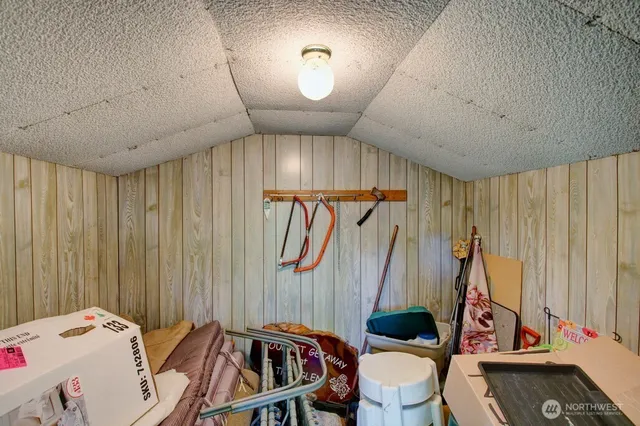 a bathroom with a sink a toilet and shower curtain