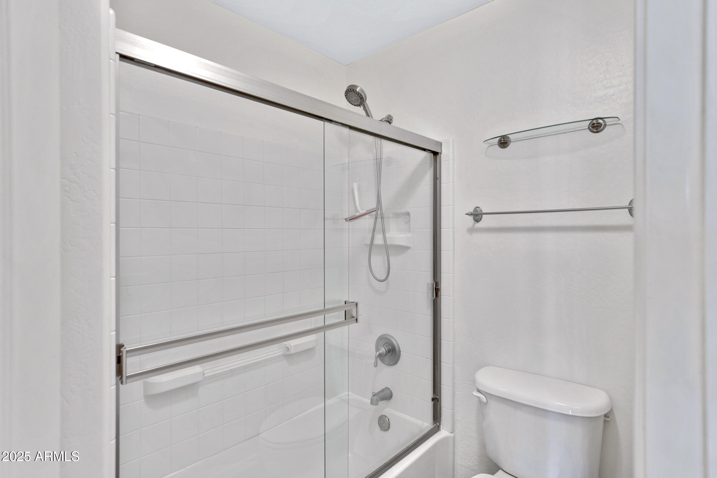 537 South Delaware Drive, Unit 224 Apache Junction, AZ 85120 - Photo 13 of 25 a bathroom with a shower and a toilet