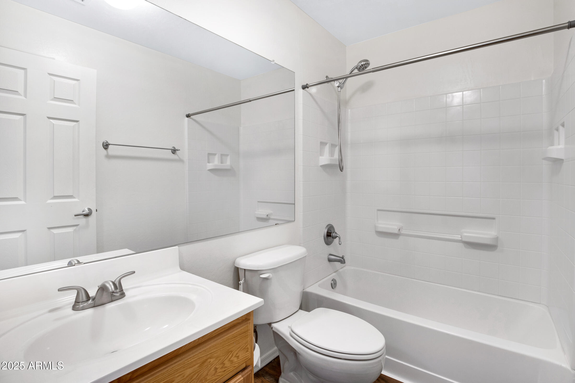537 South Delaware Drive, Unit 224 Apache Junction, AZ 85120 - Photo 15 of 25 a bathroom with a sink toilet and shower