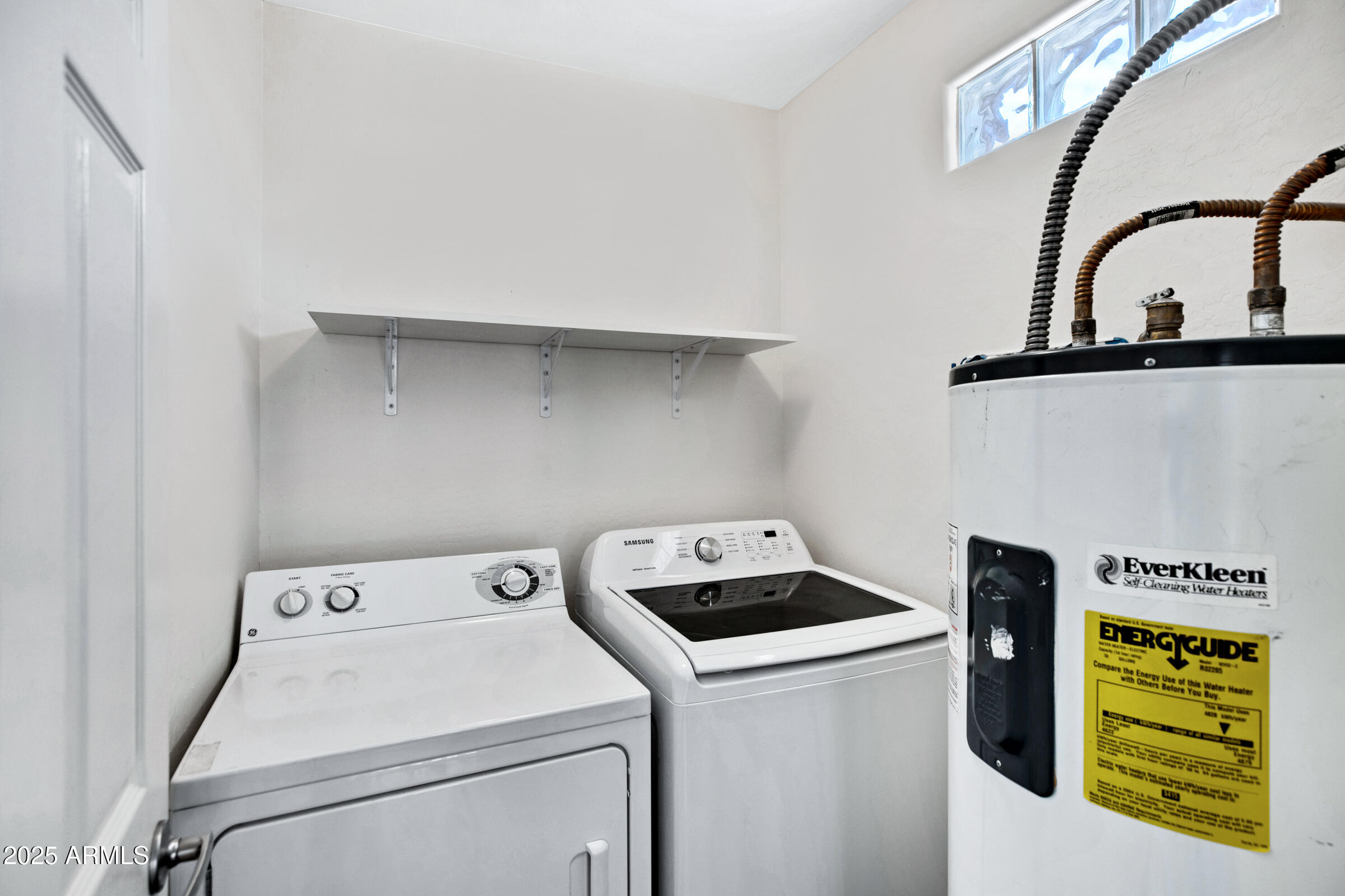 537 South Delaware Drive, Unit 224 Apache Junction, AZ 85120 - Photo 16 of 25 a utility room with dryer and washer