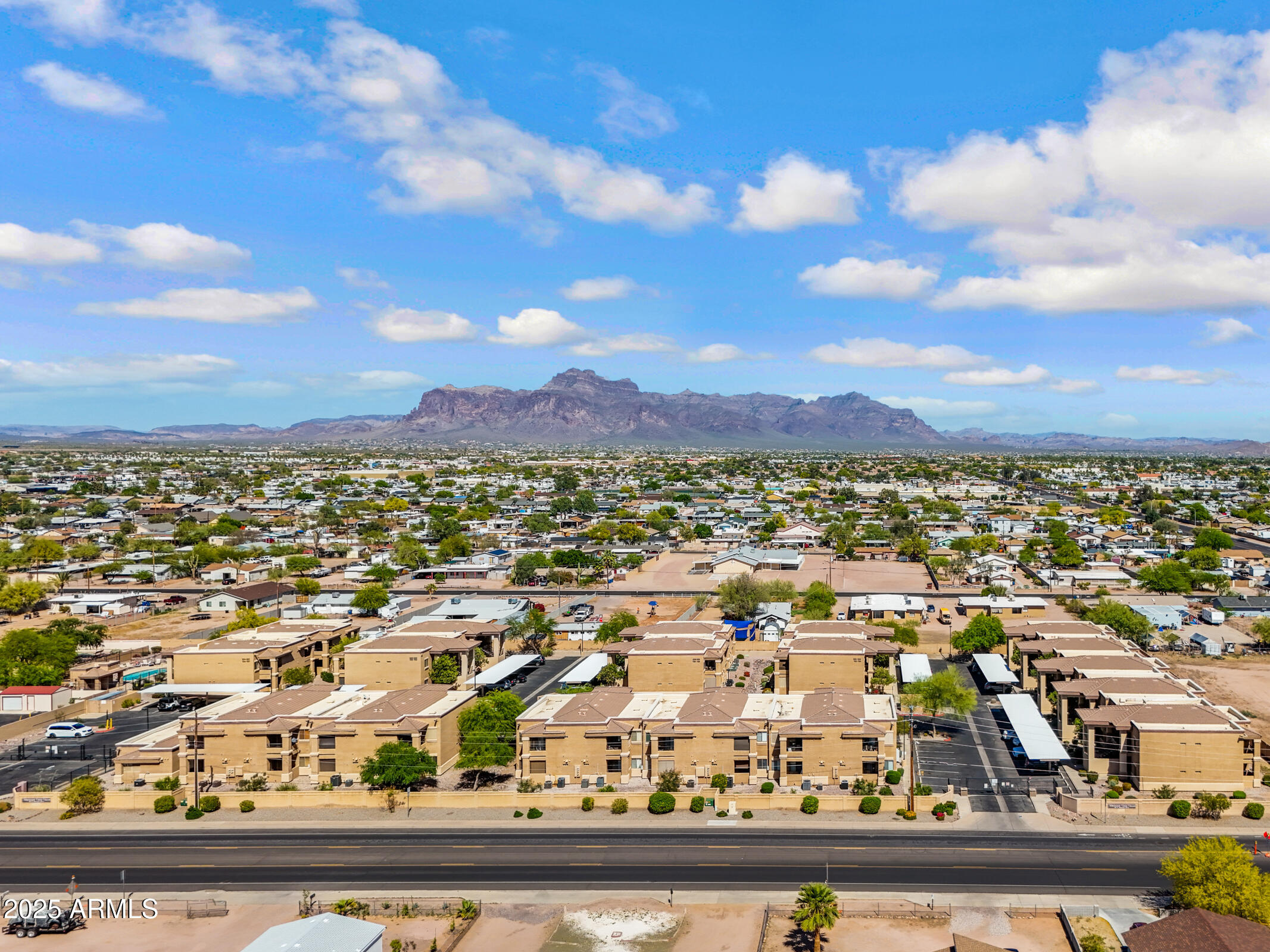 537 South Delaware Drive, Unit 224 Apache Junction, AZ 85120 - Photo 25 of 25 an aerial view of residential building and car parked