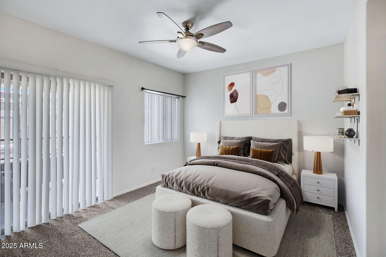 537 South Delaware Drive, Unit 224 Apache Junction, AZ 85120 - Photo 3 of 25 a bedroom with a bed and a chandelier