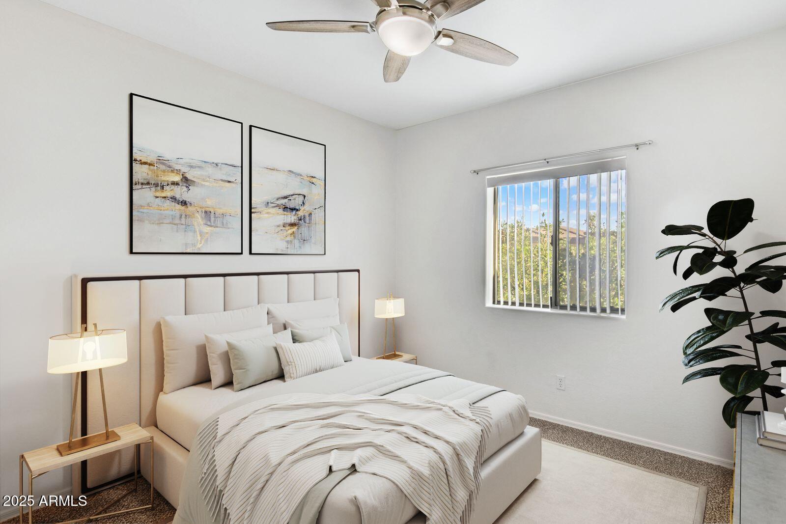 537 South Delaware Drive, Unit 224 Apache Junction, AZ 85120 - Photo 4 of 25 a bedroom with a large bed and a window