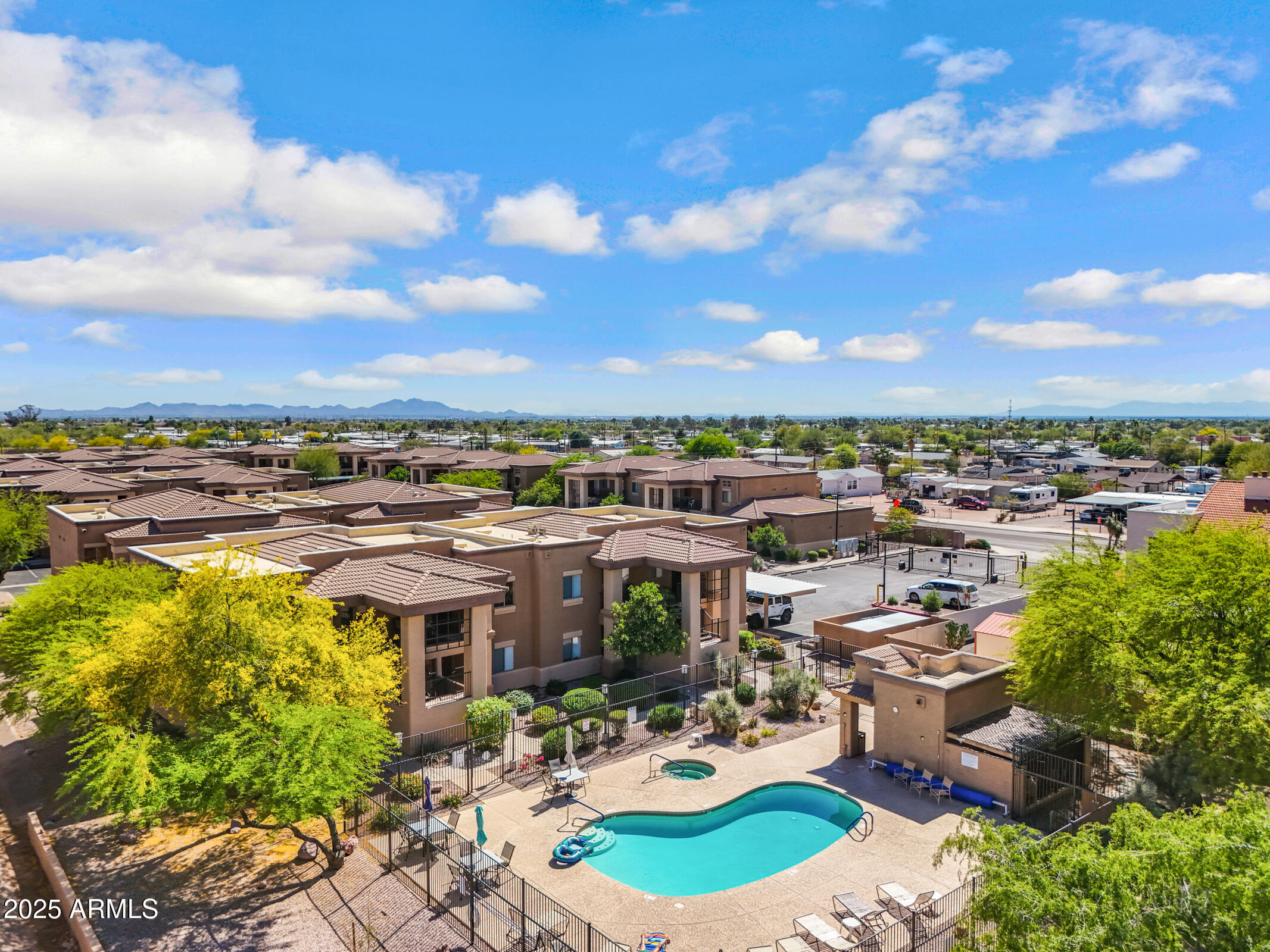 537 South Delaware Drive, Unit 224 Apache Junction, AZ 85120 - Photo 5 of 25 a view of a lake with a patio