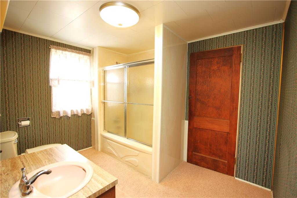438 North Alexander Monongahela, PA 15063 - Photo 16 of 34 a bathroom with a sink and a mirror