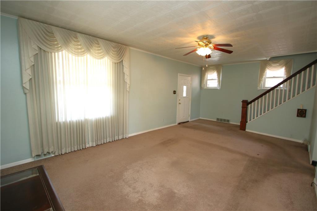 438 North Alexander Monongahela, PA 15063 - Photo 2 of 34 a view of a livingroom with a ceiling fan and window