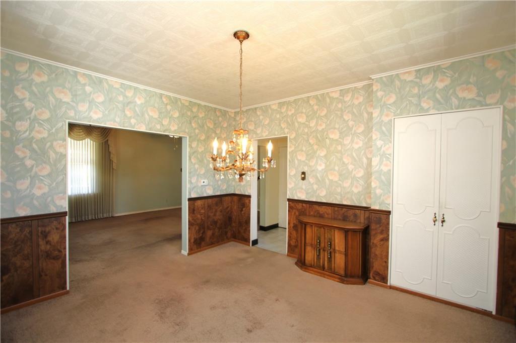 438 North Alexander Monongahela, PA 15063 - Photo 3 of 34 a view of a livingroom with furniture & cabinet door