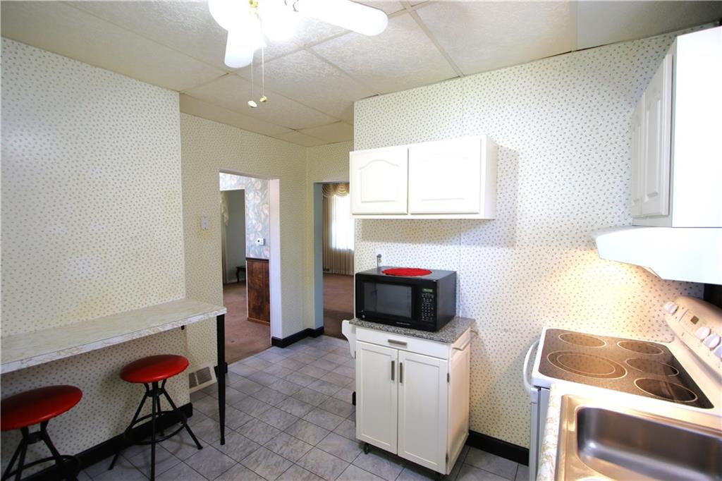 438 North Alexander Monongahela, PA 15063 - Photo 7 of 34 a living room with furniture and a flat screen tv