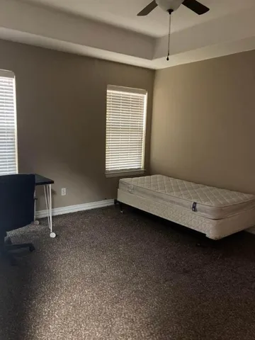 a bathroom with a sink and a window