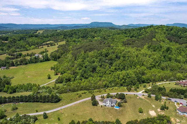 a view of a lake with a city