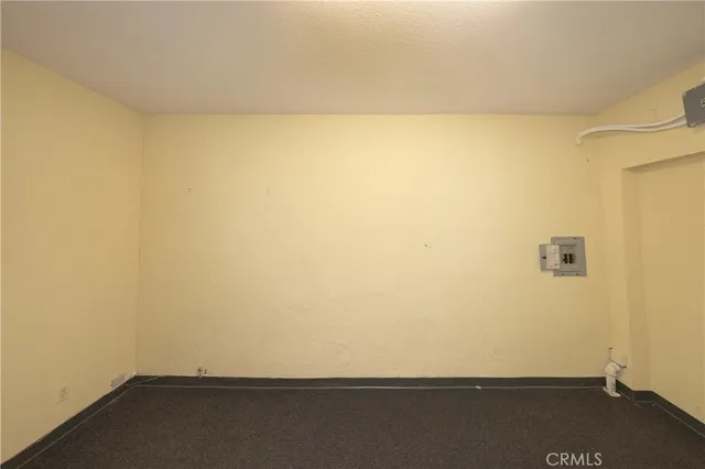 a view of a workspace with furniture