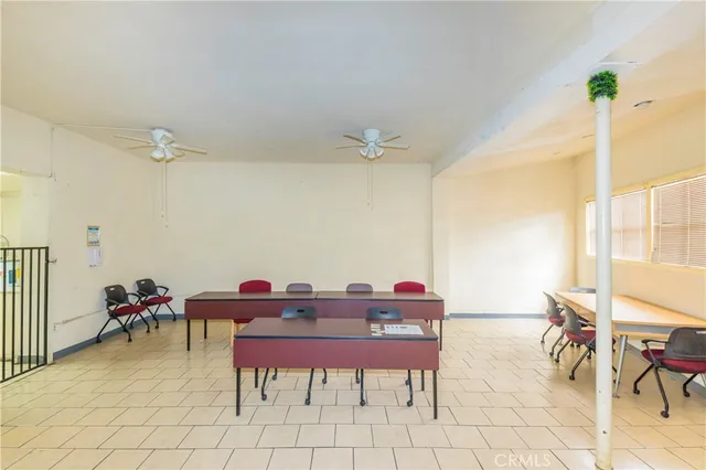 a living room with furniture and window
