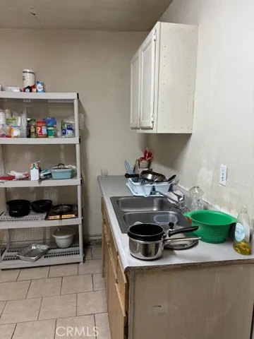 a kitchen with a stove and a cabinets