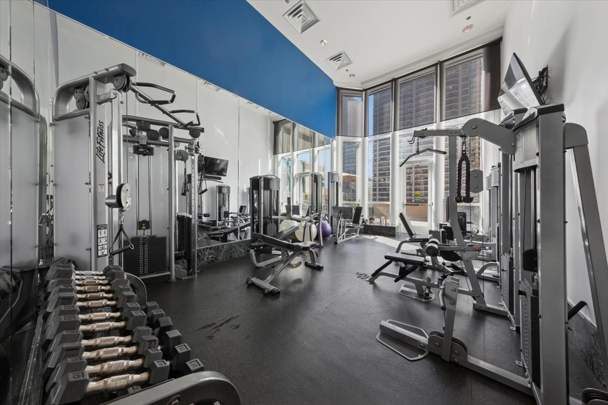 100 East Huron Street, Unit 2004 Chicago, IL 60611 - Photo 35 of 40 a view of a room with gym equipment