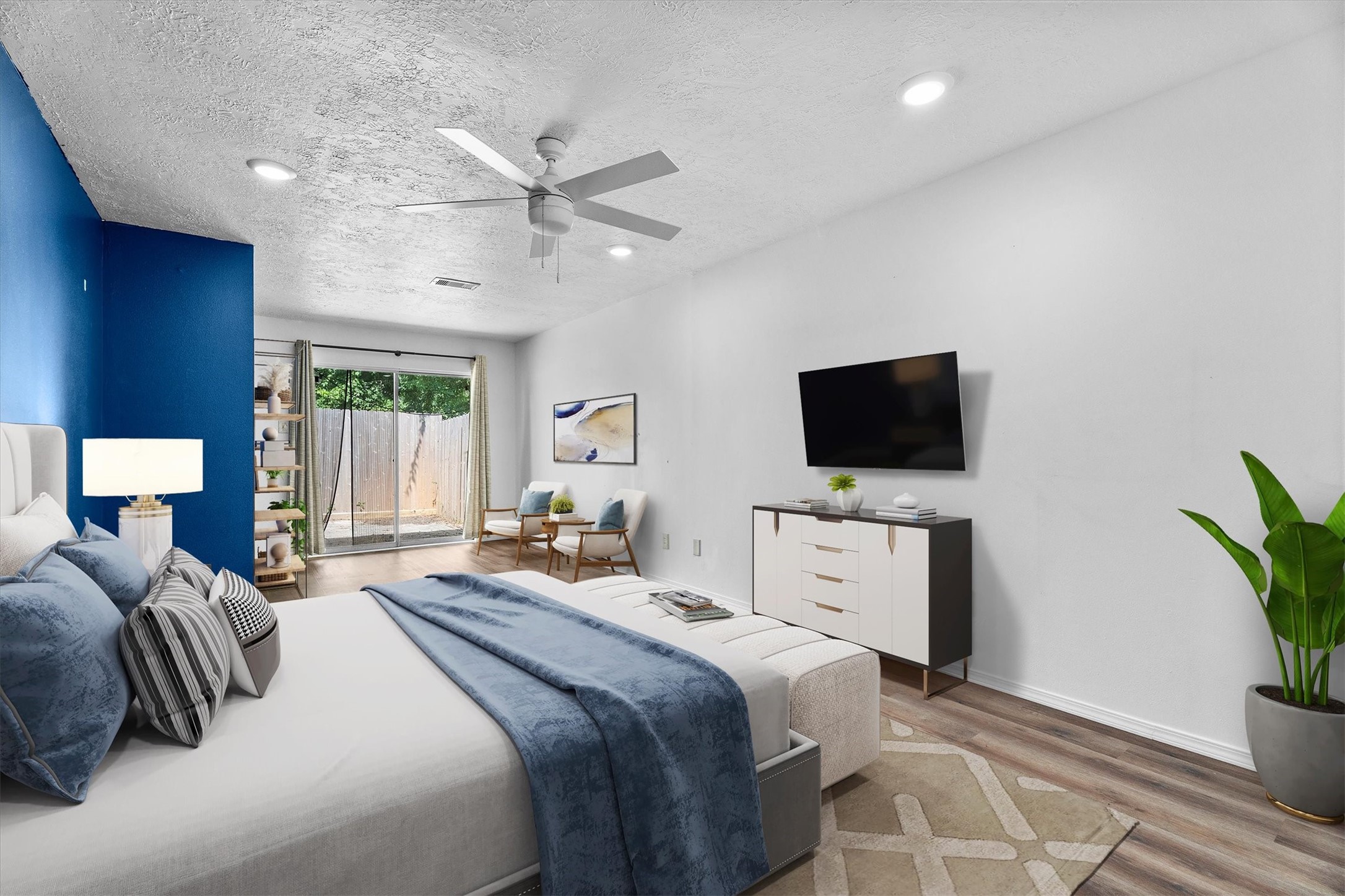 6631 Ambler Drive Spring, TX 77379 - Photo 19 of 37 a bedroom with a bed and a flat screen tv