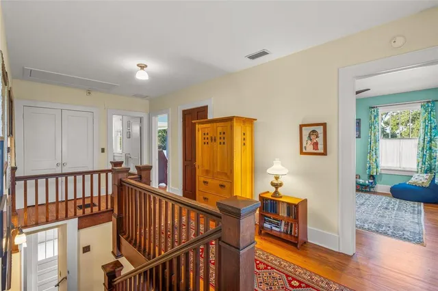 a view of a livingroom with furniture and windows