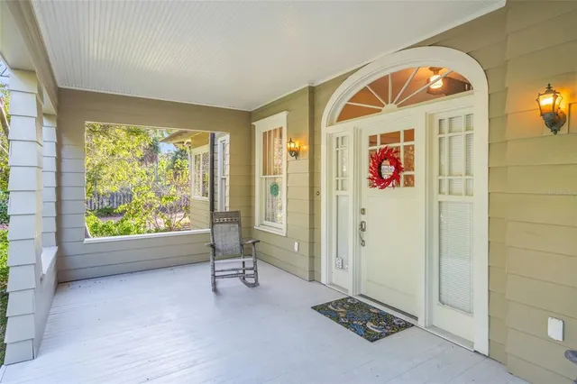 a view of an empty room and a window