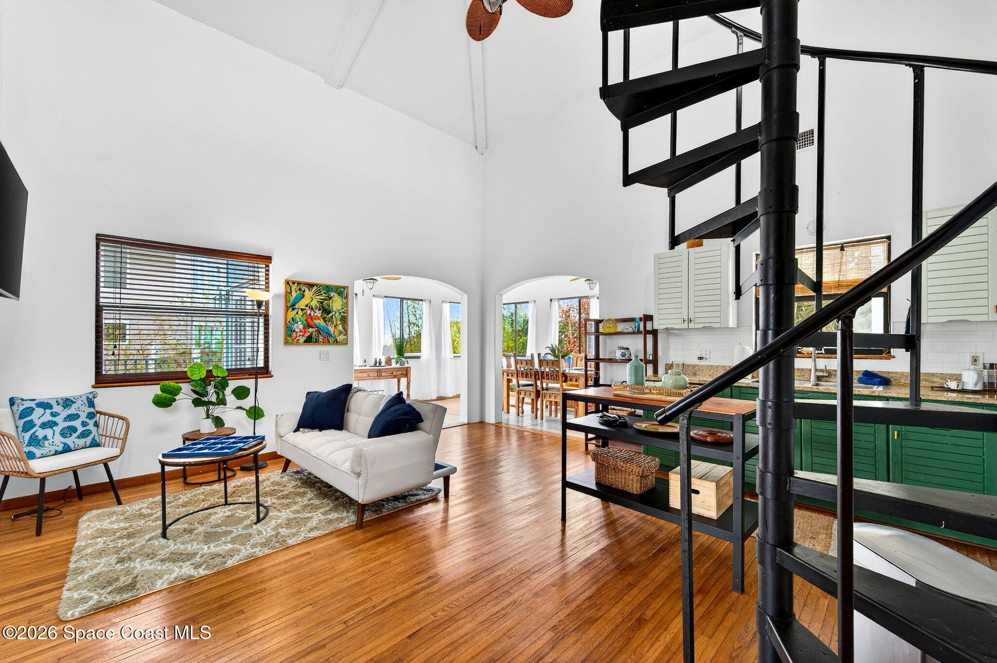 51 Vip Island, Unit B Grant, FL 32949 - Photo 16 of 49 a living room with furniture and a wooden floor