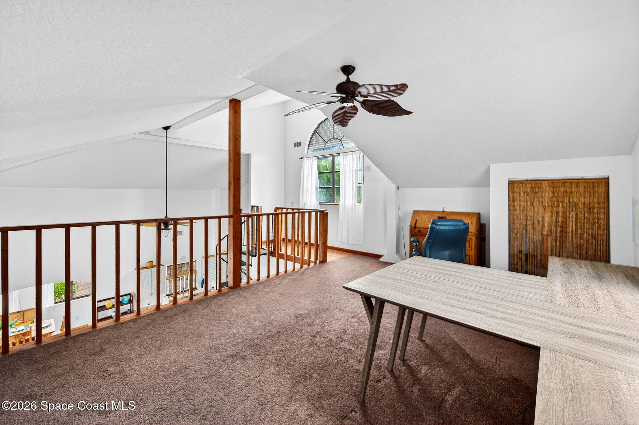 51 Vip Island, Unit B Grant, FL 32949 - Photo 23 of 49 a view of a dining room with furniture and window
