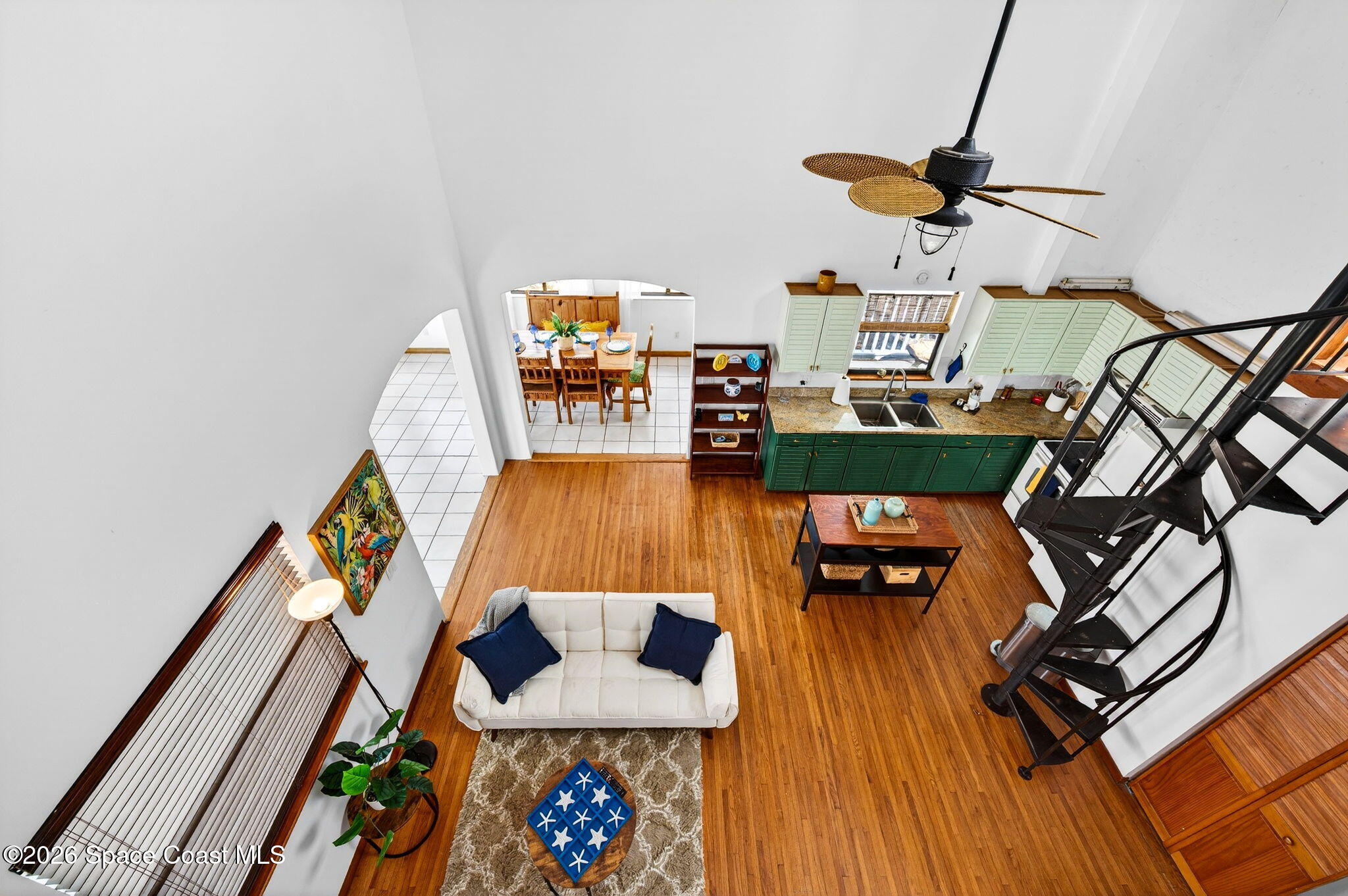 51 Vip Island, Unit B Grant, FL 32949 - Photo 26 of 49 a living room with furniture and a wooden floor