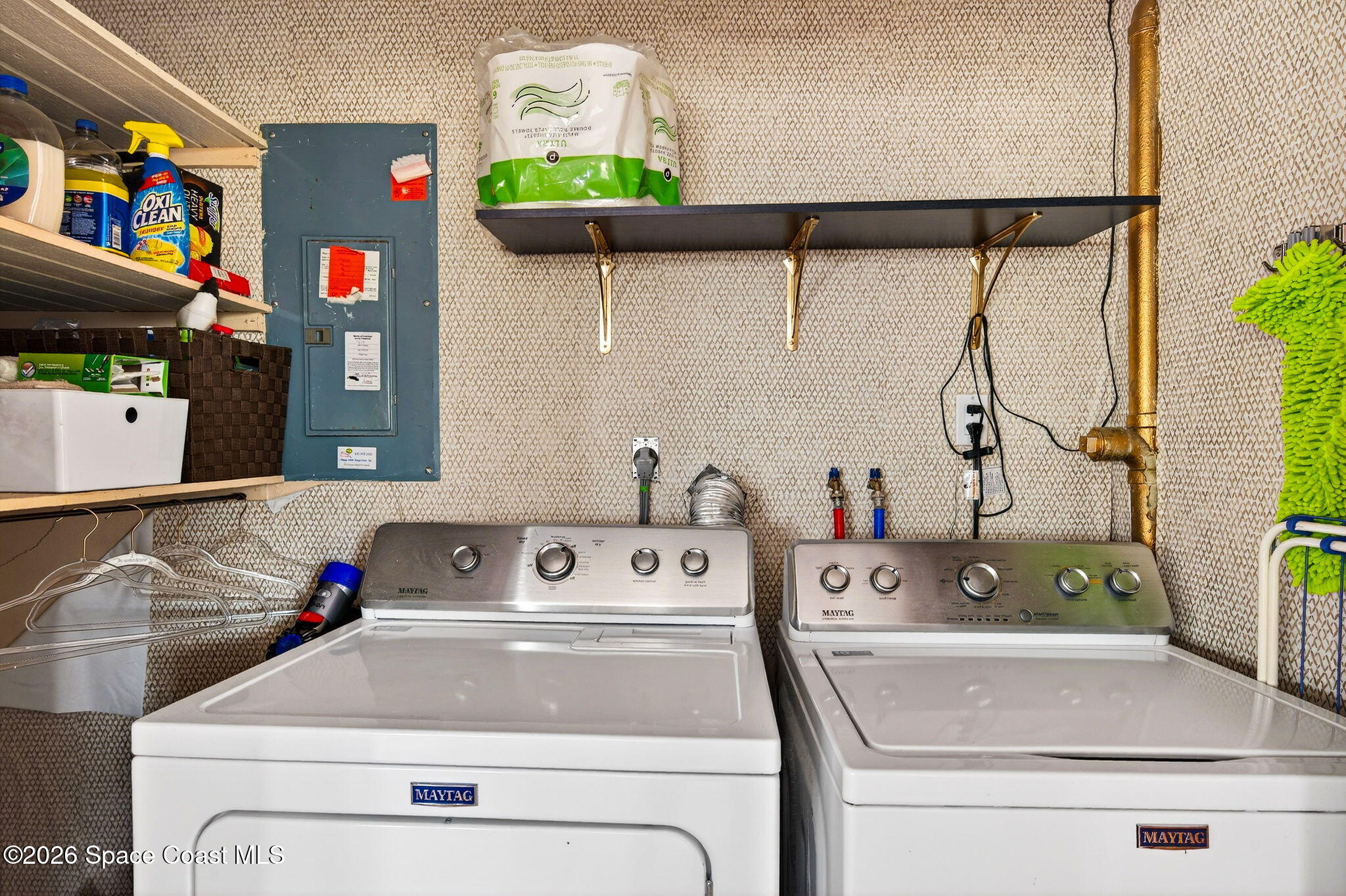 51 Vip Island, Unit B Grant, FL 32949 - Photo 27 of 49 a utility room with dryer and washer