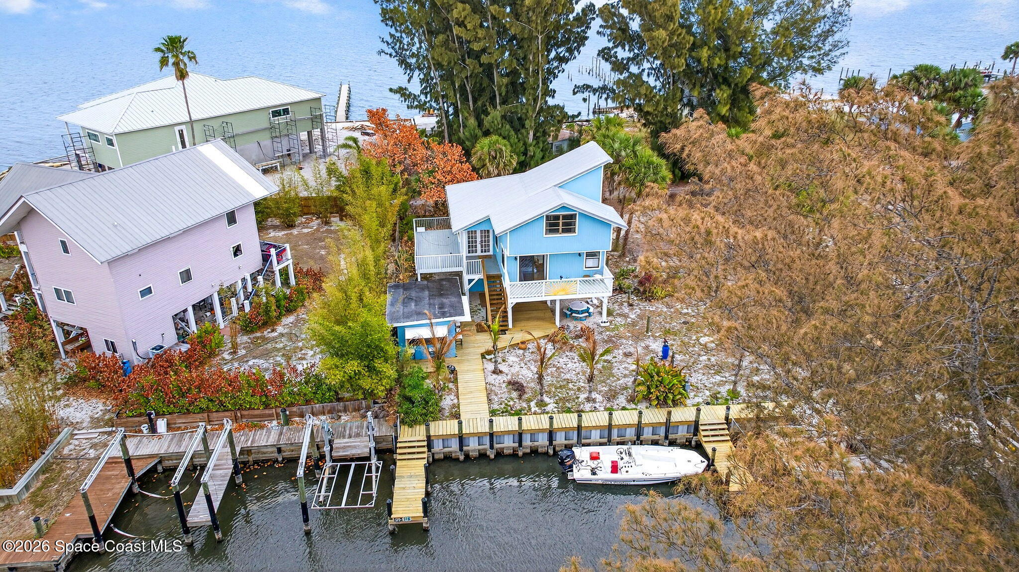 51 Vip Island, Unit B Grant, FL 32949 - Photo 32 of 49 an aerial view of a house with a yard