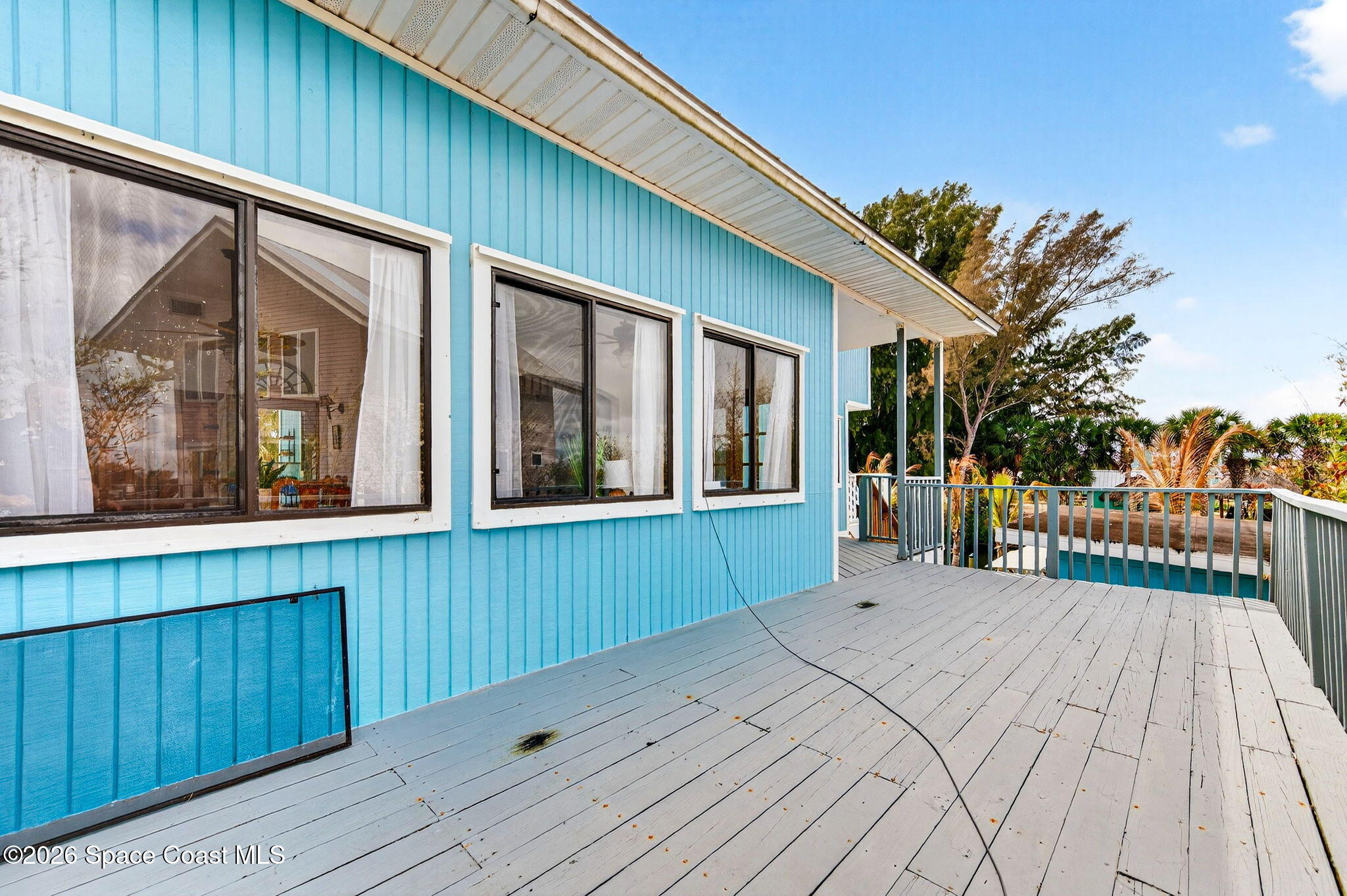 51 Vip Island, Unit B Grant, FL 32949 - Photo 39 of 49 a view of a house with a garden