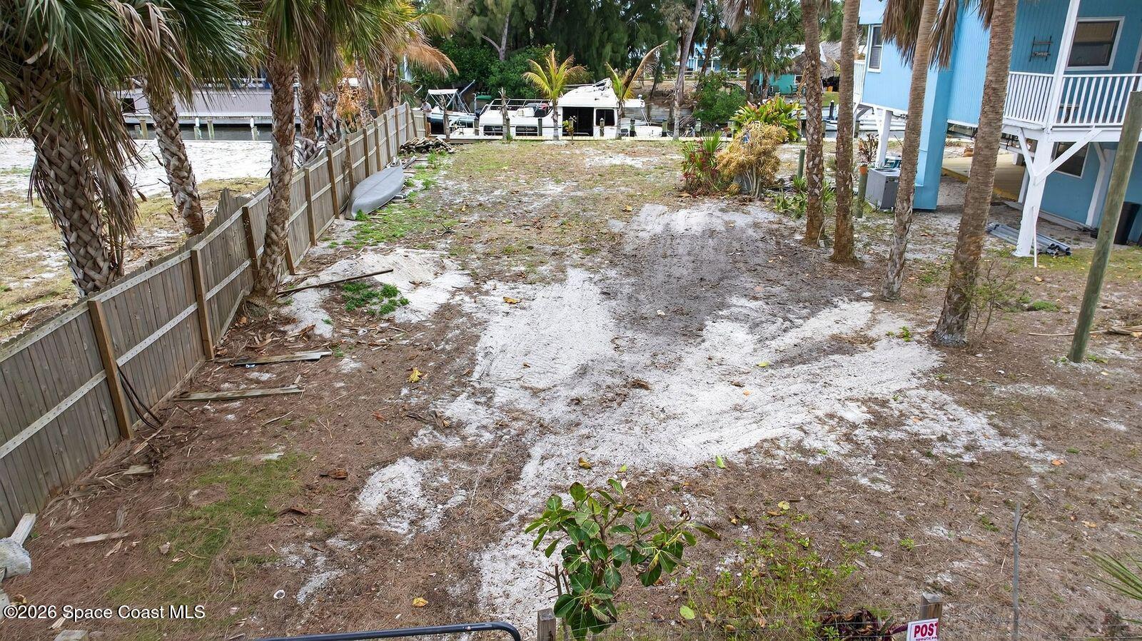 51 Vip Island, Unit B Grant, FL 32949 - Photo 45 of 49 a view of a yard with plants and trees