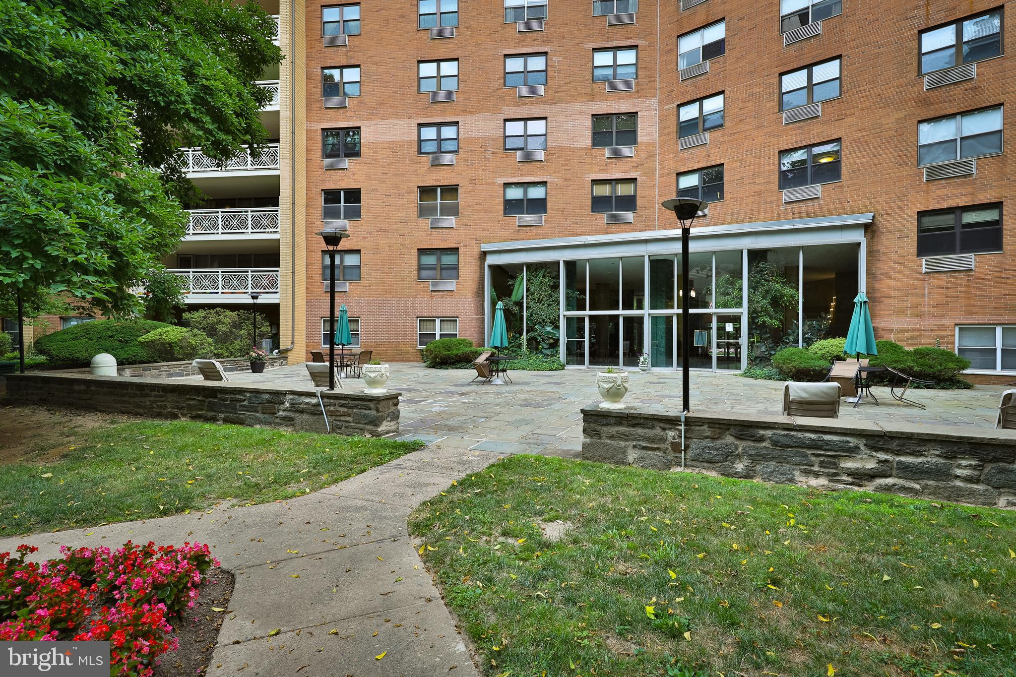 7900 Old York Road, Unit 303B Elkins Park, PA 19027 - Photo 27 of 27 a view of a building with garden