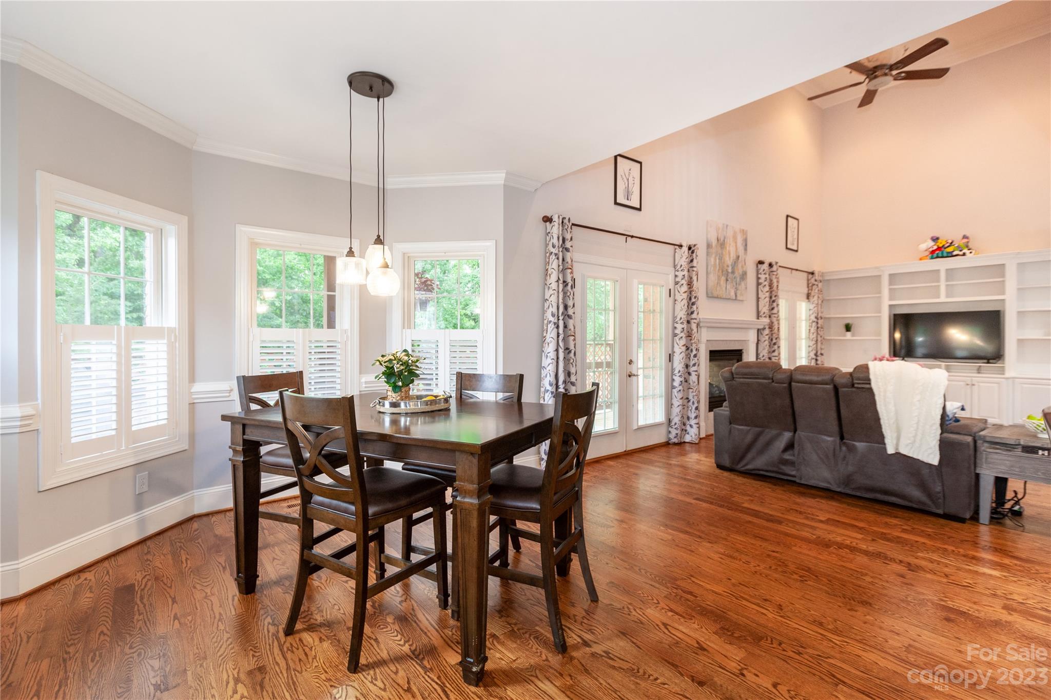 4058 Halyard Drive Denver, NC 28037 - Photo 12 of 46 a view of a dining room with furniture window and wooden floor