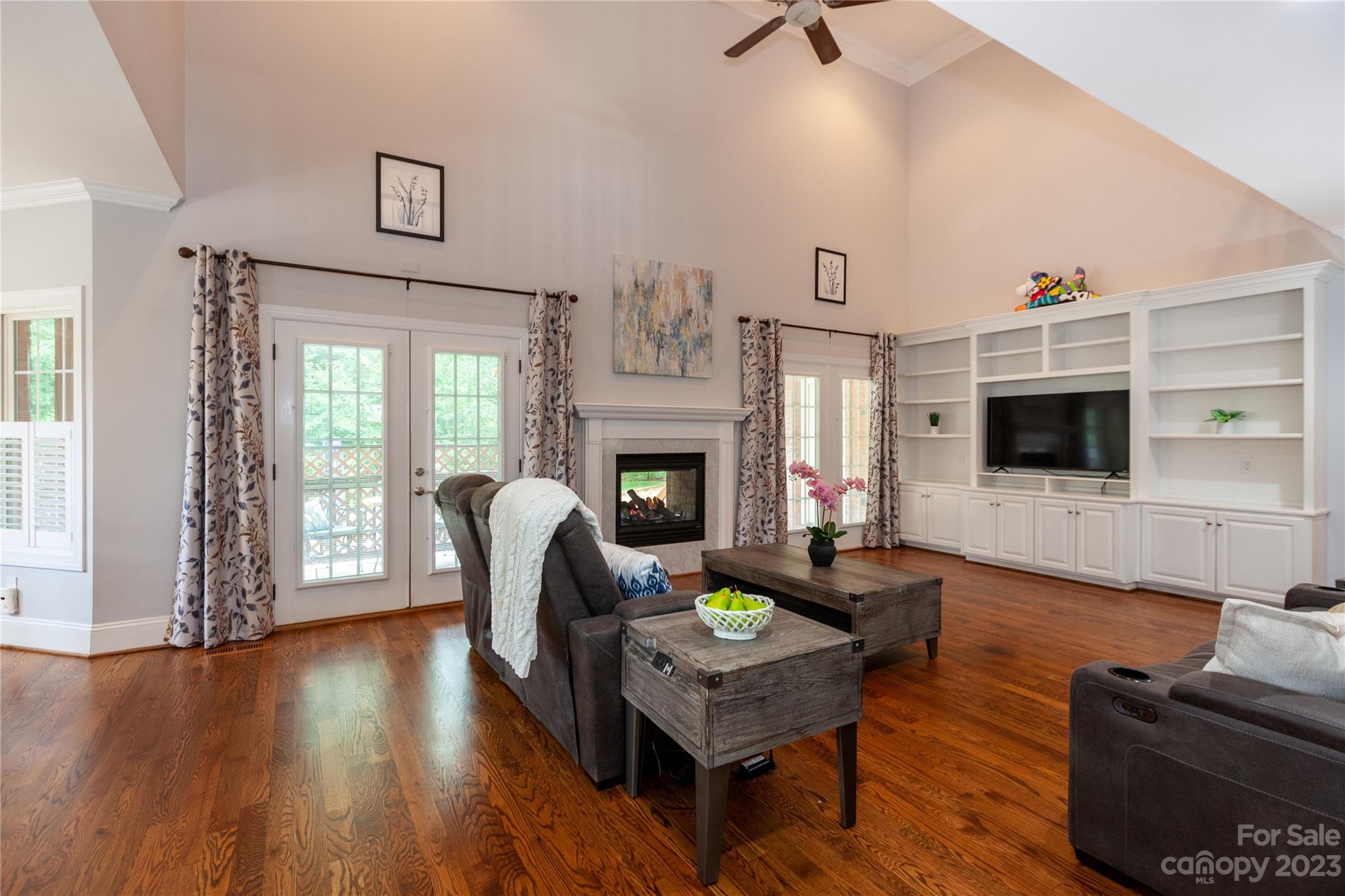 4058 Halyard Drive Denver, NC 28037 - Photo 15 of 46 a living room with furniture fireplace and flat screen tv