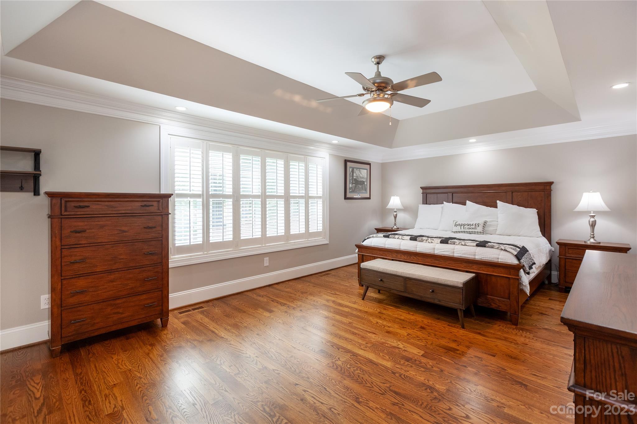 4058 Halyard Drive Denver, NC 28037 - Photo 22 of 46 a spacious bedroom with a bed and wooden floor