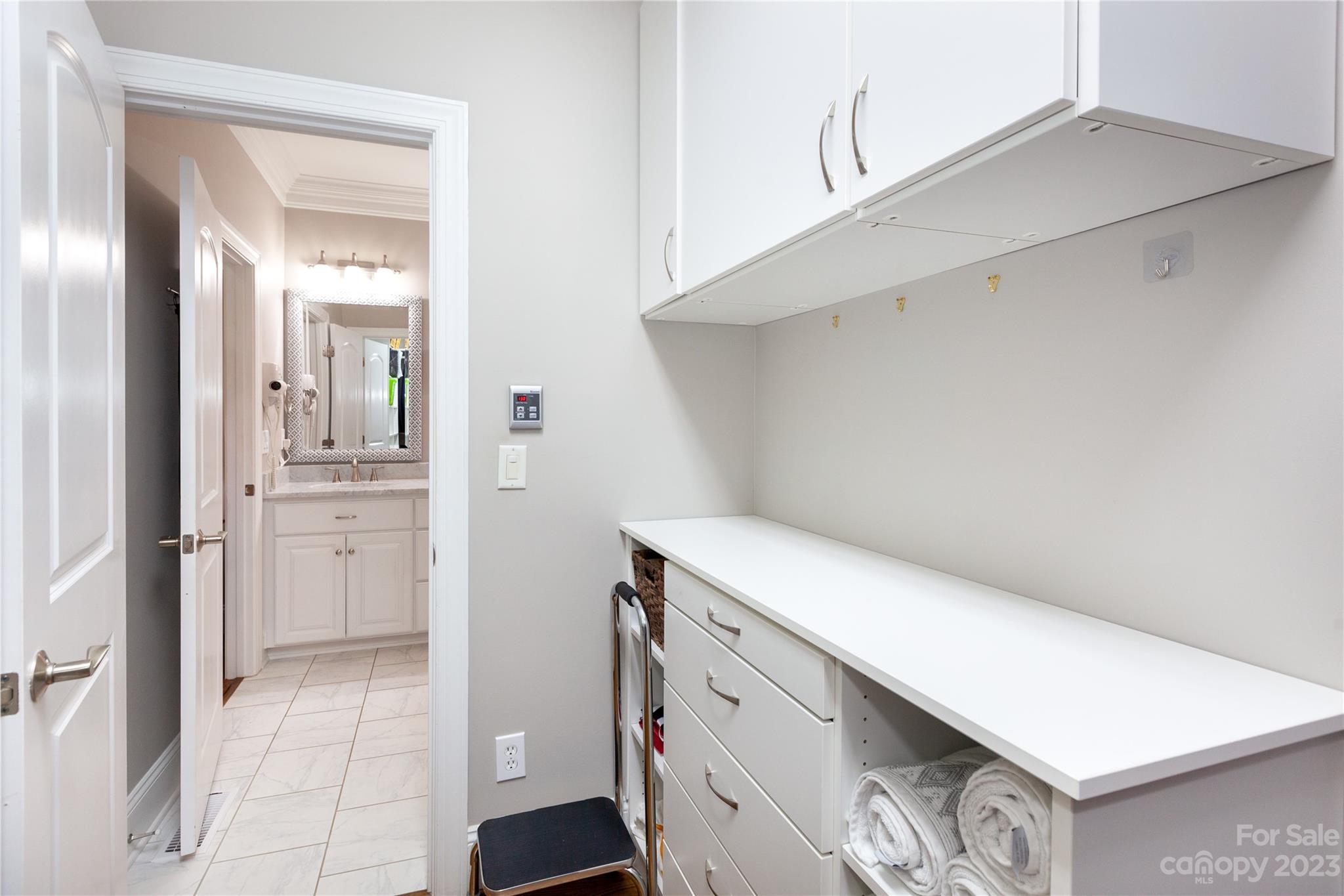 4058 Halyard Drive Denver, NC 28037 - Photo 28 of 46 a utility room with cabinets washer and dryer