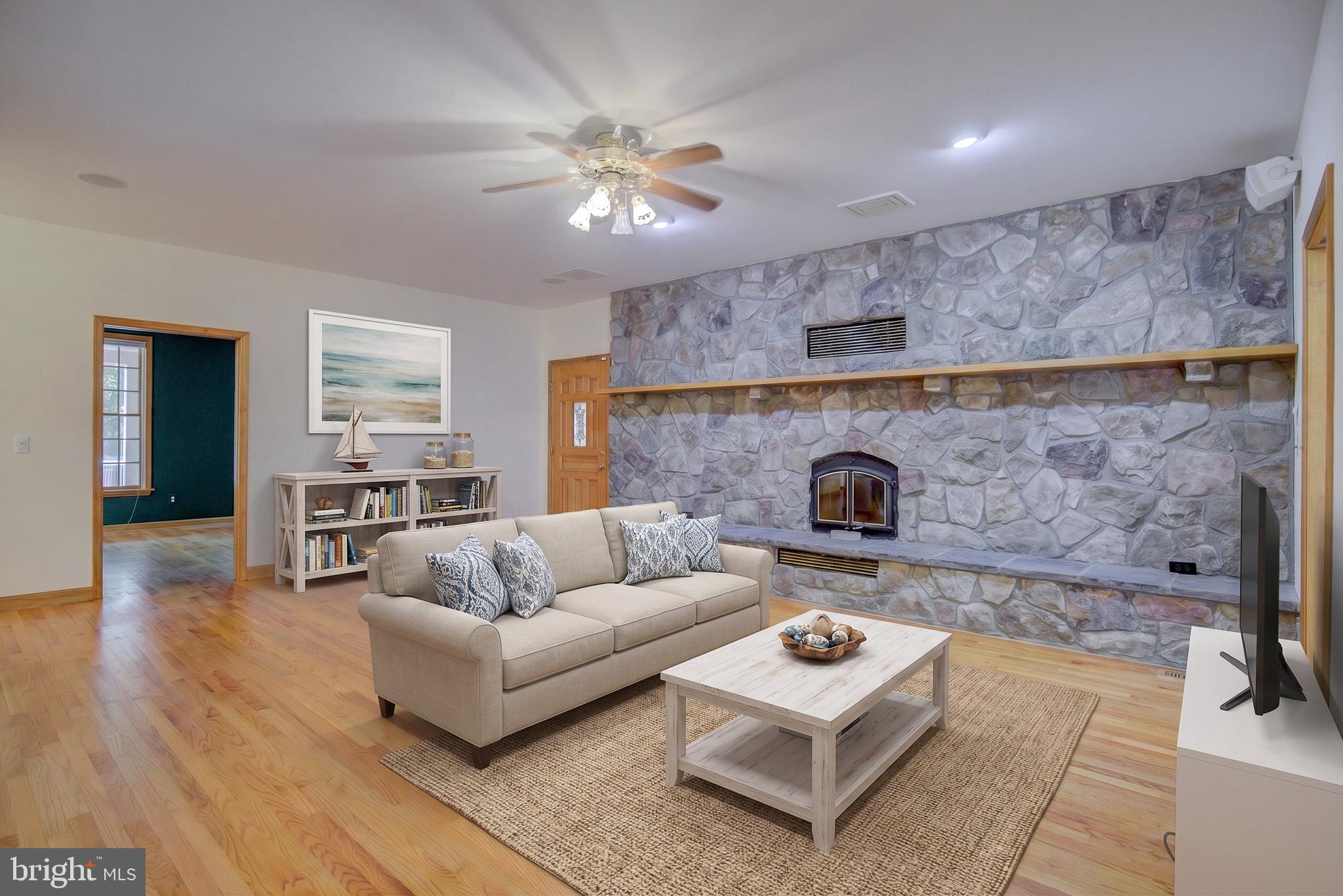 813 Blacks Hill Road Great Falls, VA 22066 - Photo 20 of 92 Expansive Stone Fireplace in Family Room