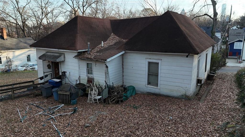 1052 Curran Street Northwest Atlanta, GA 30318 - Photo 11 of 13 a view of a house with a backyard