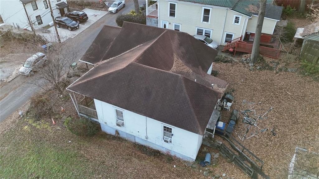 1052 Curran Street Northwest Atlanta, GA 30318 - Photo 6 of 13 a view of a house with outdoor space
