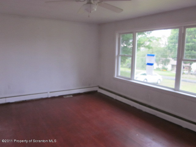 50 Dukerich Road Union Dale, PA 18470 - Photo 5 of 10 a view of an empty room with a window