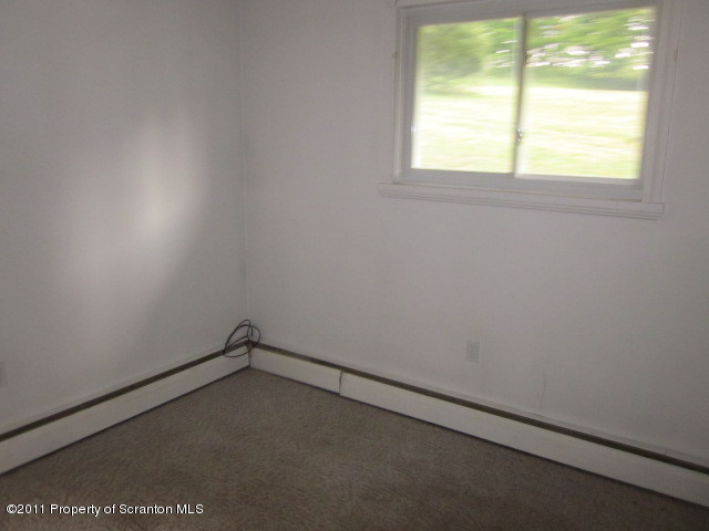 50 Dukerich Road Union Dale, PA 18470 - Photo 8 of 10 an empty room with a window
