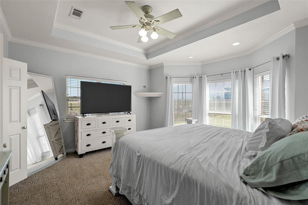 3696 Old Lorena Road Lorena, TX 76655 - Photo 16 of 27 Spacious room featuring a tray ceiling, recessed lighting, and a ceiling fan