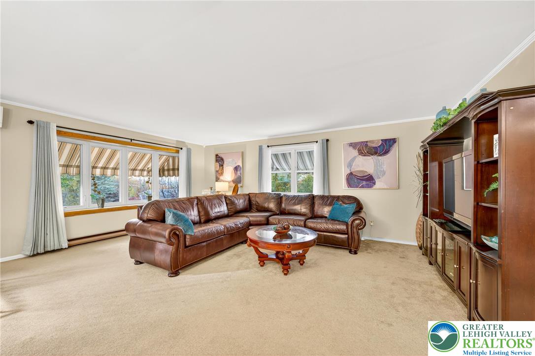 849 Weil Street Bethlehem, PA 18015 - Photo 11 of 58 a living room with furniture and a flat screen tv