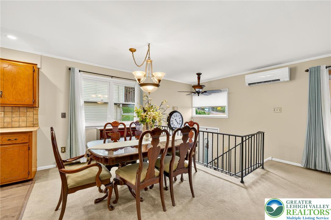 849 Weil Street Bethlehem, PA 18015 - Photo 15 of 58 a view of a dining room with furniture and window