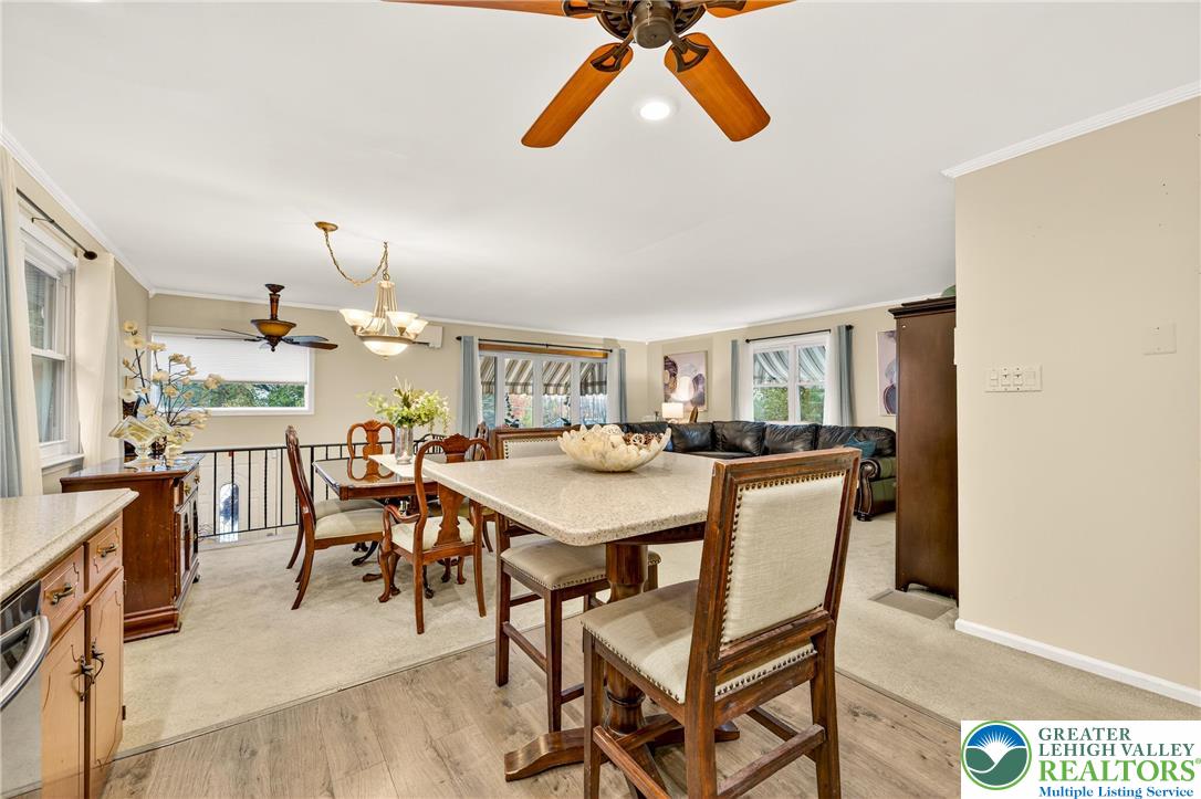 849 Weil Street Bethlehem, PA 18015 - Photo 22 of 58 a view of a dining room with furniture and a chandelier
